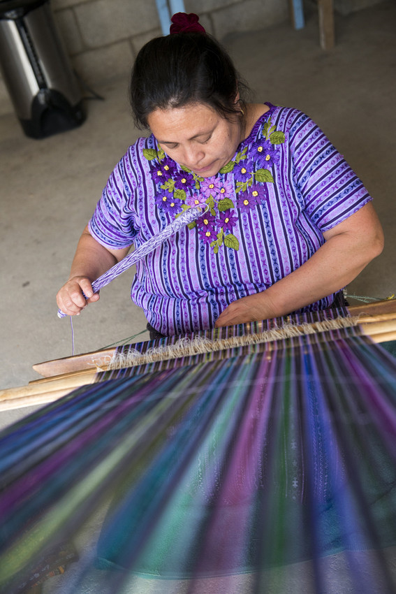 Concepción Morales Soloj weaves during a Women’s Group meeting at the ANADESA office in Panabaj, Guatemala. 
	ANADESA’s women’s group, Proactive Women, occasionally meets together with their handicra